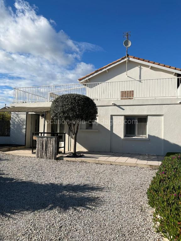 Photo de Joli appartement privé jardin à 10min des plages