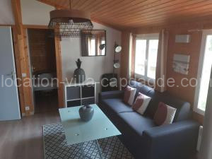 Chalet climatisé avec piscine chauffée et parking dans une pinède calme - FR-1-607-64 à Agde